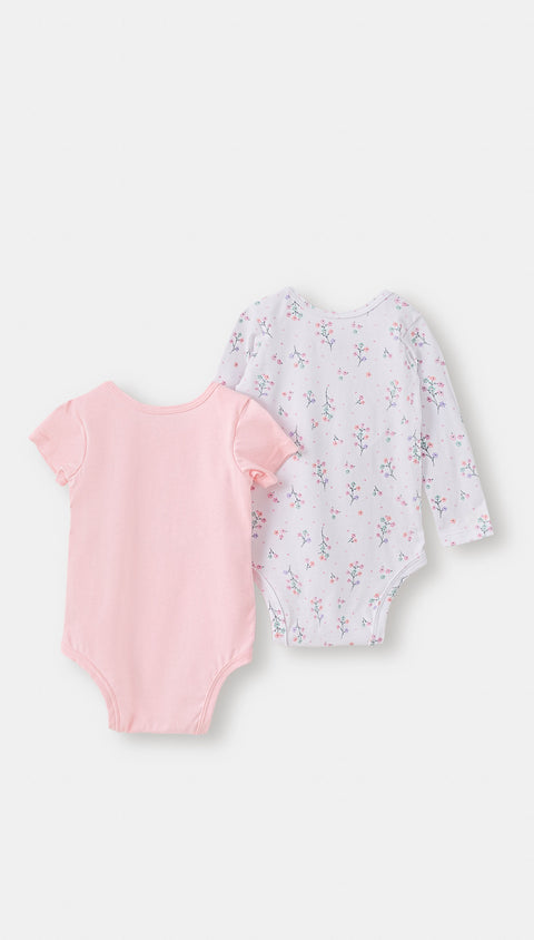 Body x 2 para recién nacida en tela suave color rosado claro y blanco