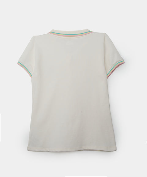 Camiseta tipo polo para niña en algodón color marfil