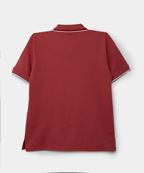 Camiseta tipo polo para niño en algodón color rojo