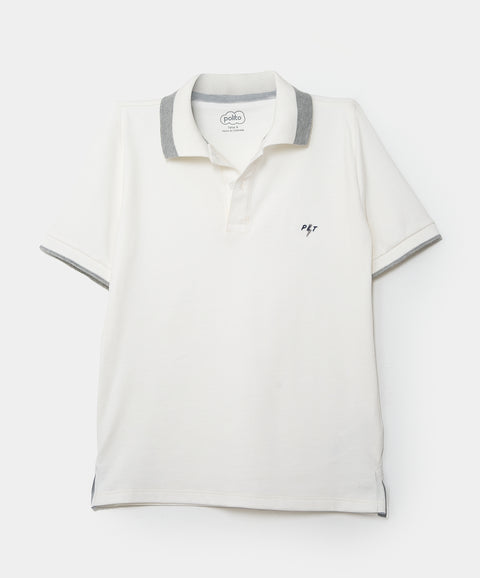 Camiseta tipo polo para niño en algodón color marfil