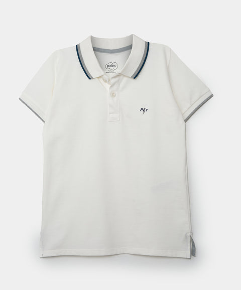 Camiseta tipo polo para bebé niño en algodón color marfil