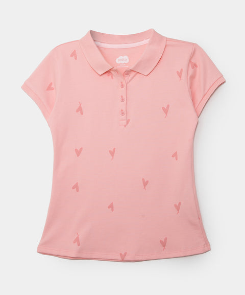 Camiseta tipo polo para niña en algodón color salmón