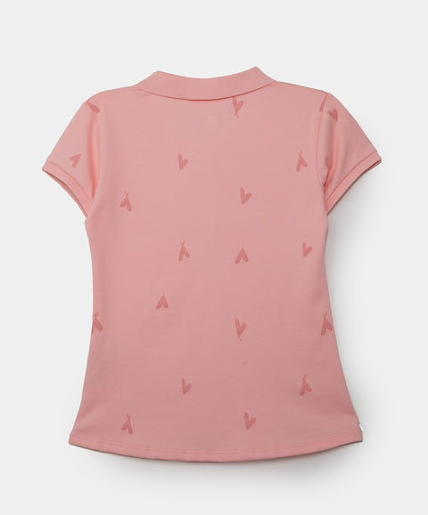 Camiseta tipo polo para niña en algodón color salmón