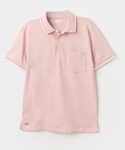 Camiseta tipo polo para niño en algodón color rosado