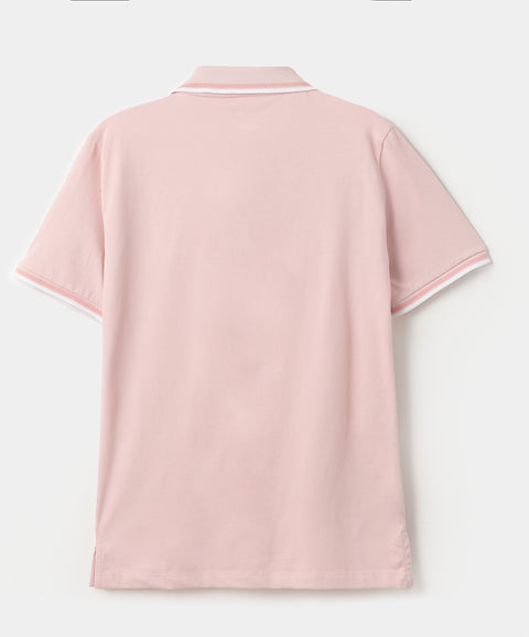Camiseta tipo polo para niño en algodón color rosado