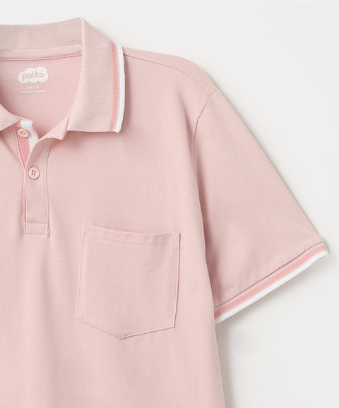 Camiseta tipo polo para niño en algodón color rosado