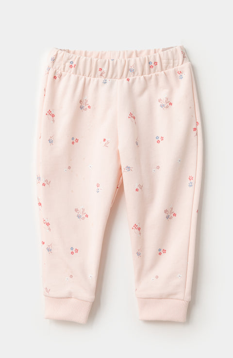 Conjunto de buzo y jogger para recién nacida en burda color rosado claro con estampado de flores