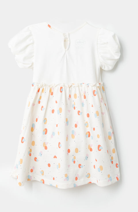 Vestido para recién nacida en tela suave color marfil