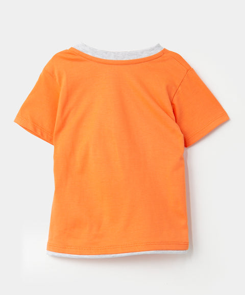 Camiseta para recién nacido en tela suave color naranja