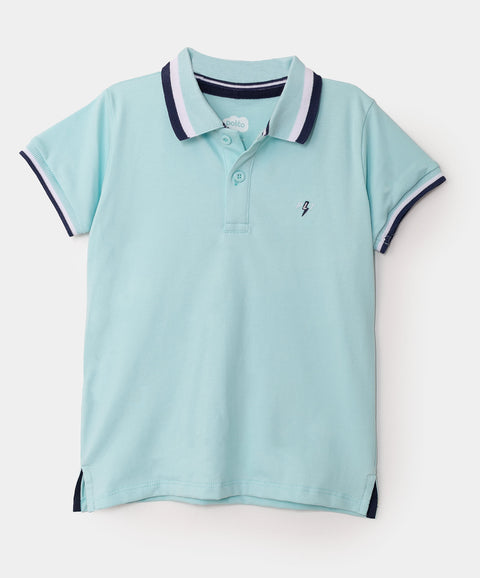 Camiseta tipo polo para niño en algodón color aqua
