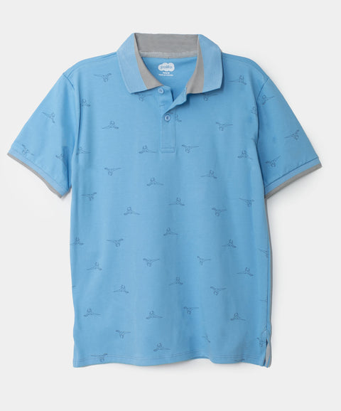 Camiseta tipo polo para niño en algodón color azul claro