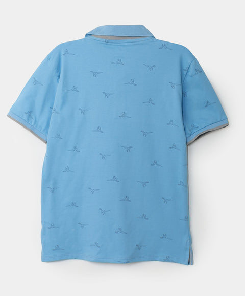 Camiseta tipo polo para niño en algodón color azul claro