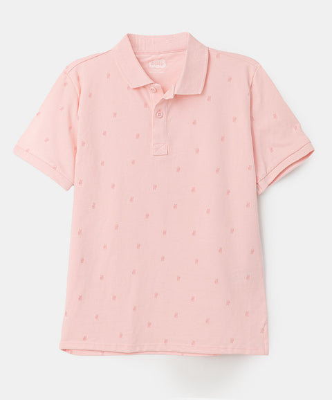 Camiseta tipo polo para niño en algodón color rosado claro