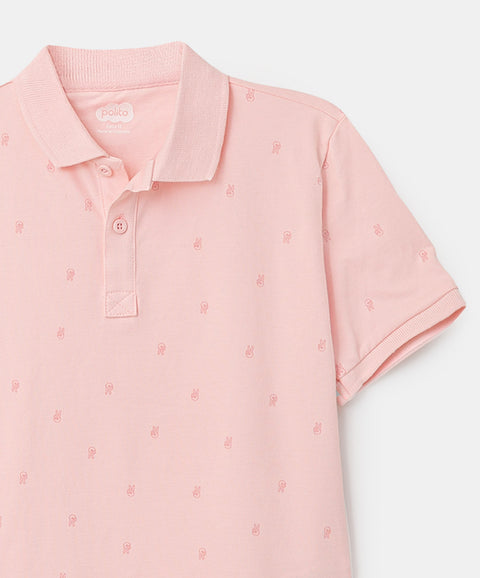 Camiseta tipo polo para niño en algodón color rosado claro