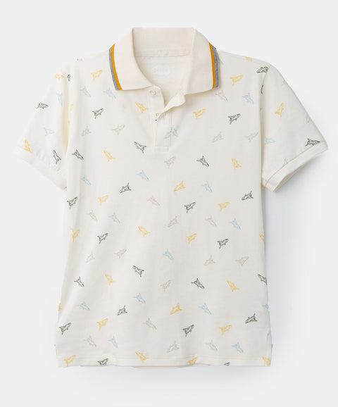 Camiseta tipo polo para niño en algodón color marfil