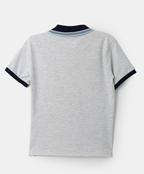 Camiseta tipo polo para niño en algodón color blanco jasped