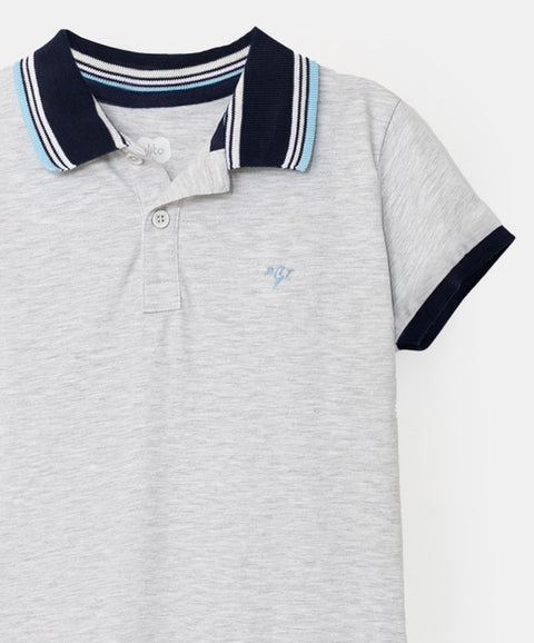 Camiseta tipo polo para bebé niño en algodón color blanco jasped