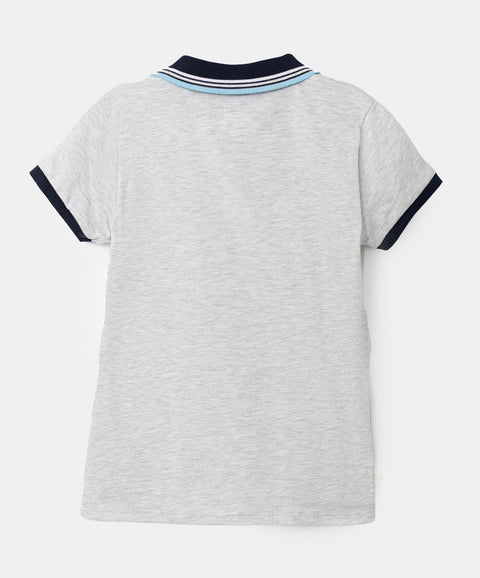 Camiseta tipo polo para bebé niño en algodón color blanco jasped
