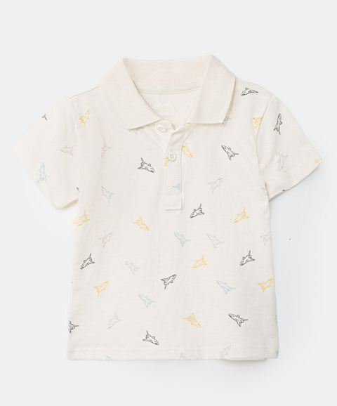 Camiseta tipo polo para recién nacido en algodón color marfil