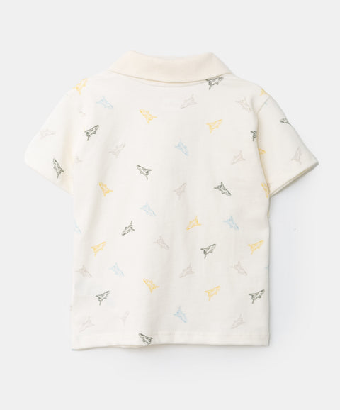 Camiseta tipo polo para recién nacido en algodón color marfil