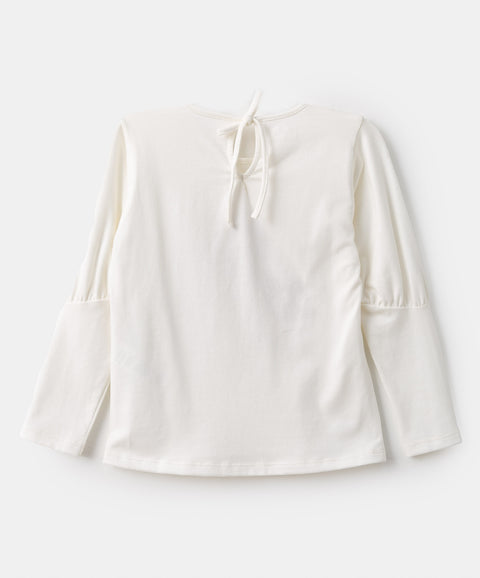 Camiseta para bebé niña en licra color marfil