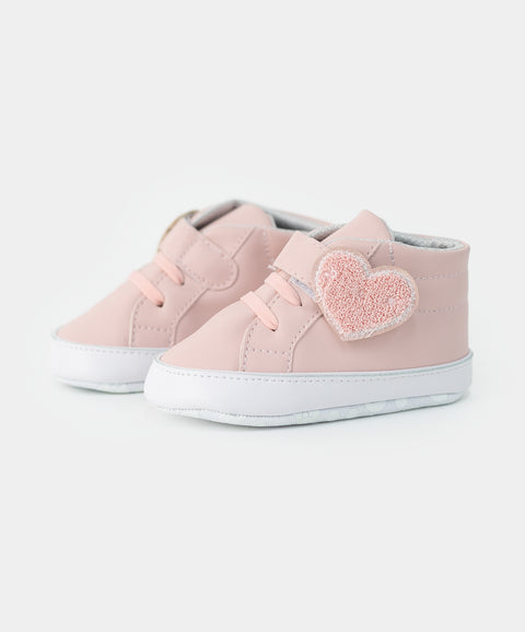 Tenis para recién nacida en material sintético color rosado