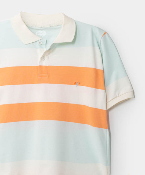 Camiseta tipo polo para niño en algodón color marfil