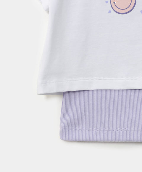 Camiseta sobrepuesta para bebé niña en licra color blanco con lila