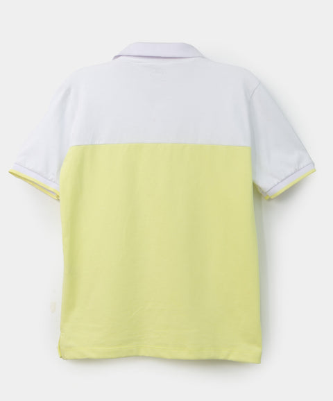 Camiseta tipo polo para niño en algodón color lima con blanco