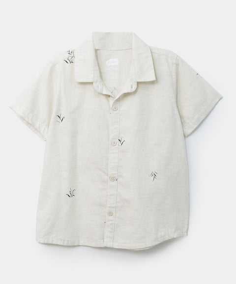 Camisa manga corta para bebé niño en algodón color marfil con estampado de hojas