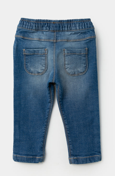 Jean Para Recién Nacida En Burda Color Índigo Con Bordados De Flores