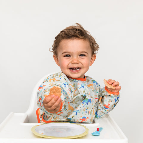 Babero para bebé niño color verde con estampado de dinosaurios