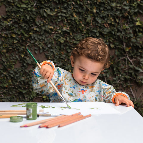 Babero para bebé niño color verde con estampado de dinosaurios